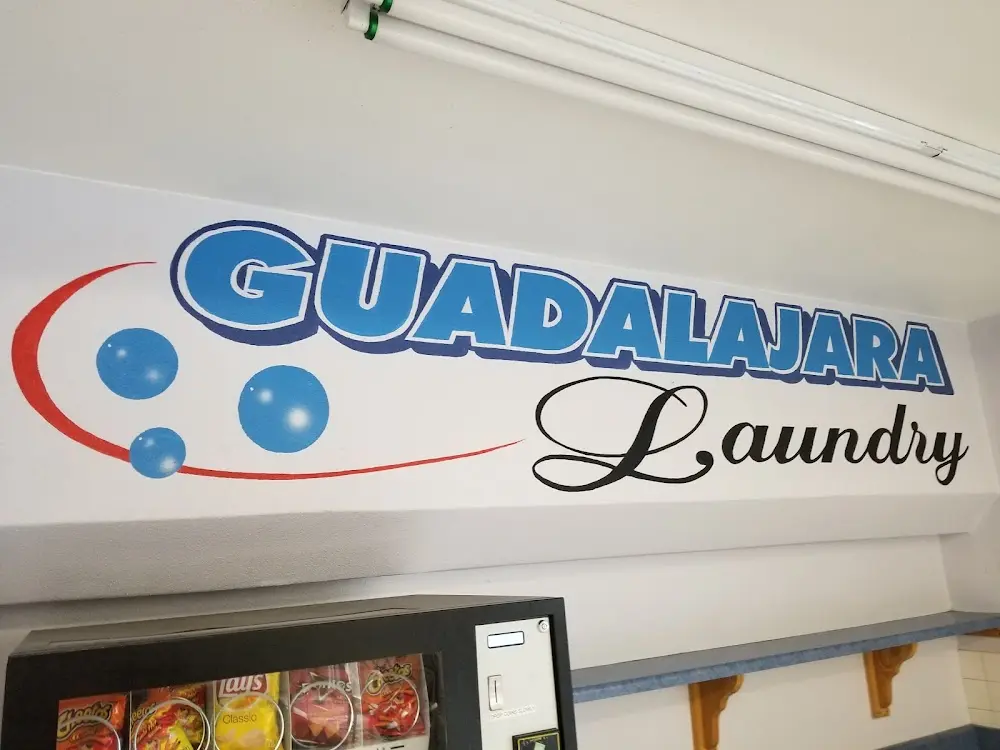 Folding space and laundry facilities at Wash'em Up Laundry #4 - Laundromat Aurora